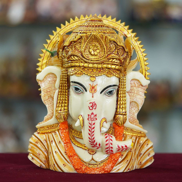 Marble Dust Ganesha Ji Face Statue Sitting on a Table